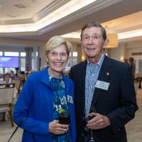 Fred and Helen Brenner standing and smiling for camera